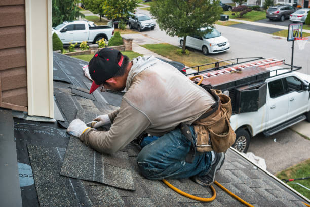 Professional Flat Roof Repair technician working in Ellicott City, MD